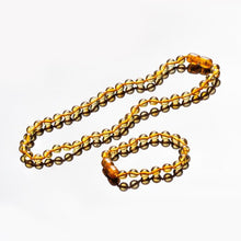 Load image into Gallery viewer, Baby&#39;s Amber Natural Teething Necklace and Bracelet Set, Honey - BabysAmber.com